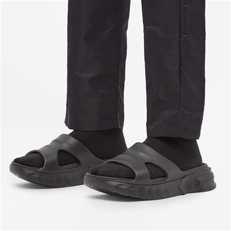 all black givenchy slides|givenchy marshmallow slide.